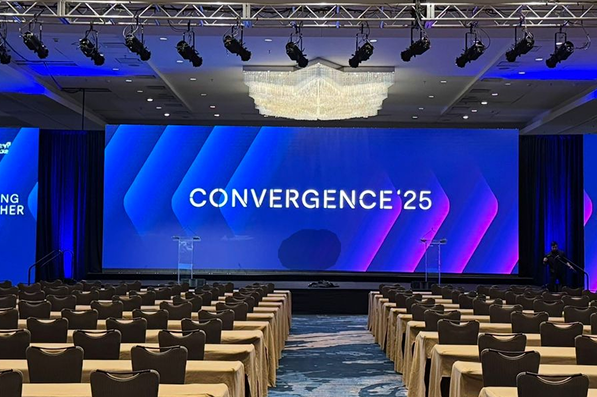 Corporate meeting room with a seamless indoor fixed LED display on the front wall